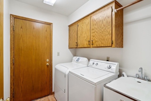 16625 Tanglewood Dr, Brookfield, WI 53005 - washroom with cabinet space, separate washer and dryer, and light tile patterned floors