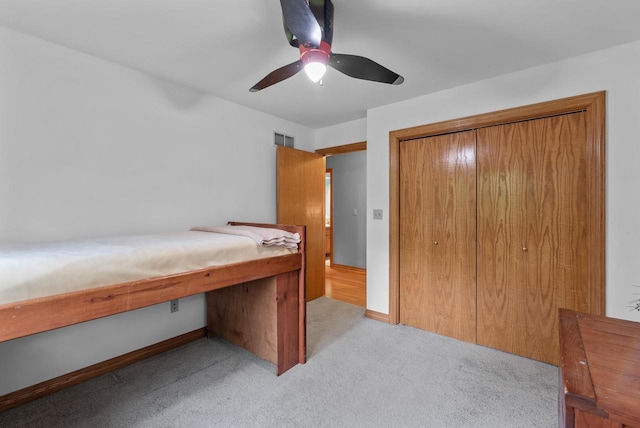 6241 N 118th St, Milwaukee, WI 53225 - unfurnished bedroom with a closet, light colored carpet, and ceiling fan