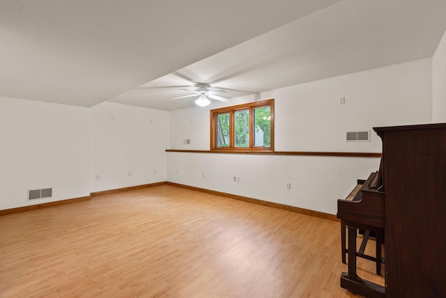 6241 N 118th St, Milwaukee, WI 53225 - spare room featuring ceiling fan, light wood finished floors, and baseboards