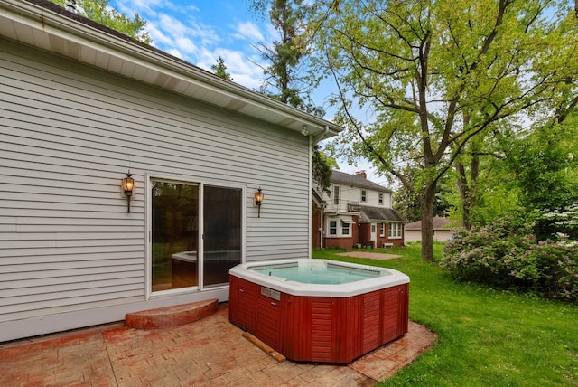 6241 N 118th St, Milwaukee, WI 53225 - view of grassy yard featuring a hot tub and a patio