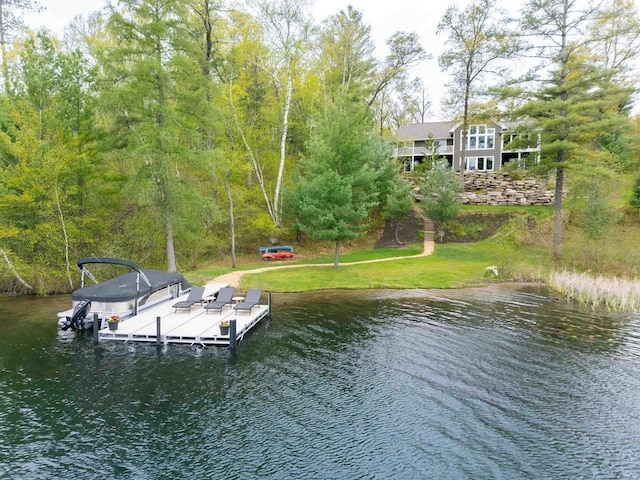 W12900 W Shore Dr, Crivitz, WI 54114 - dock area with a water view and a lawn