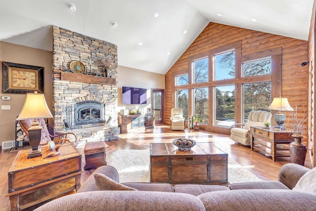 W12900 W Shore Dr, Crivitz, WI 54114 - living room with high vaulted ceiling, hardwood / wood-style floors, a stone fireplace, and recessed lighting