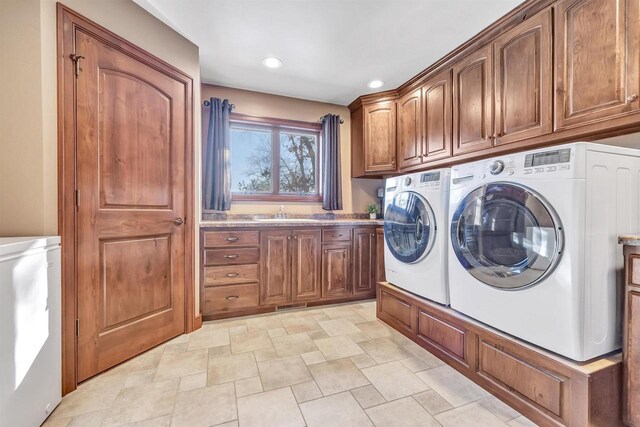 W12900 W Shore Dr, Crivitz, WI 54114 - laundry room with washer and clothes dryer, cabinet space, and recessed lighting