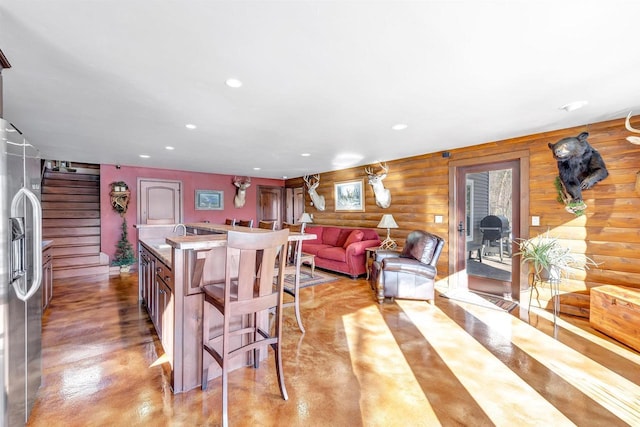 W12900 W Shore Dr, Crivitz, WI 54114 - living room with log walls, recessed lighting, and concrete floors