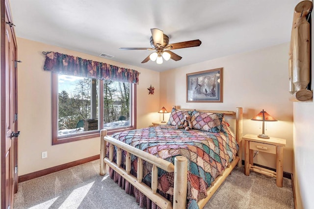 W12900 W Shore Dr, Crivitz, WI 54114 - carpeted bedroom featuring baseboards and a ceiling fan