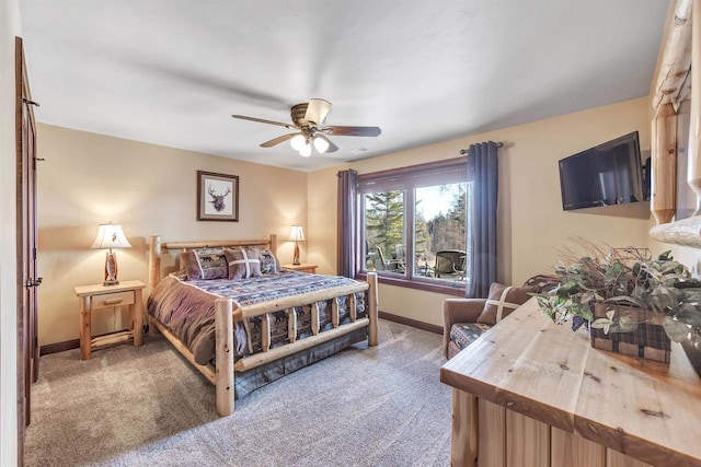 W12900 W Shore Dr, Crivitz, WI 54114 - bedroom featuring baseboards, carpet floors, and a ceiling fan