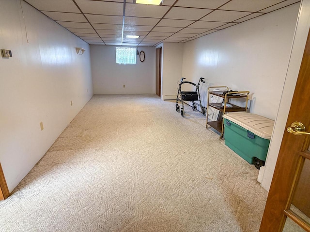 315 Lampert St, Oshkosh, WI 54901 - below grade area featuring carpet floors and a paneled ceiling