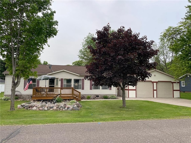 505 Lake Ave, Frederic, WI 54837 - view of front of house with a front lawn, a deck, concrete driveway, and crawl space