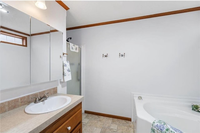 505 Lake Ave, Frederic, WI 54837 - full bath with vanity, a garden tub, baseboards, a shower, and ornamental molding