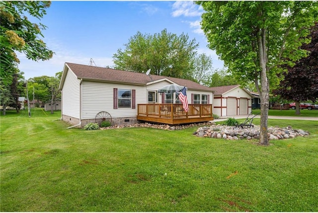 505 Lake Ave, Frederic, WI 54837 - rear view of house featuring crawl space, a wooden deck, a lawn, and driveway