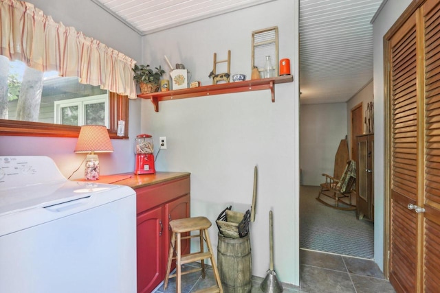 950 N Dousman Rd, Summit, WI 53066 - washroom with washer / dryer, cabinet space, and dark tile patterned flooring