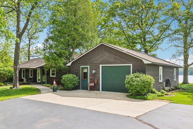 950 N Dousman Rd, Summit, WI 53066 - ranch-style house featuring concrete driveway and a garage