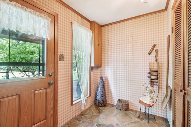 950 N Dousman Rd, Summit, WI 53066 - entryway featuring ornamental molding, wallpapered walls, and stone finish flooring