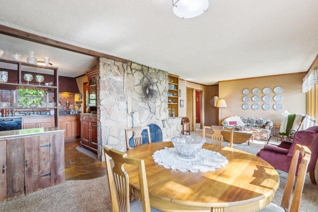 950 N Dousman Rd, Summit, WI 53066 - dining room featuring dark colored carpet and a textured ceiling