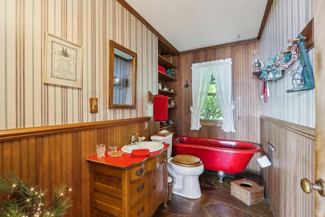 950 N Dousman Rd, Summit, WI 53066 - full bath featuring a freestanding bath, vanity, wallpapered walls, toilet, and crown molding