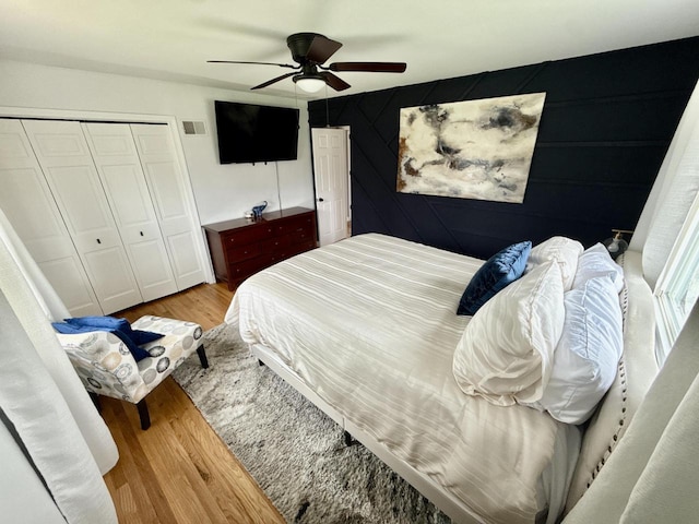 219 W Daphne St, Milwaukee, WI 53217 - bedroom with wood finished floors, a ceiling fan, and a closet