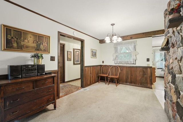 954 N Dousman Rd, Summit, WI 53066 - dining area with light colored carpet, a wainscoted wall, a chandelier, ornamental molding, and an office area