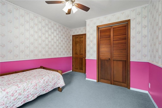 632 E 2nd St, New Richmond, WI 54017 - bedroom featuring a closet, carpet floors, ornamental molding, and a ceiling fan