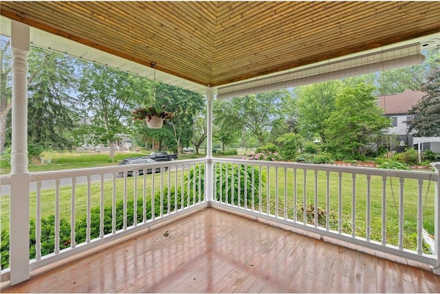 632 E 2nd St, New Richmond, WI 54017 - deck featuring a lawn