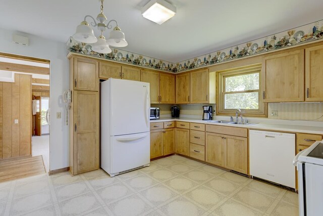 4705 Agate Ln, Madison, WI 53714 - kitchen with white appliances, a sink, light countertops, and light flooring