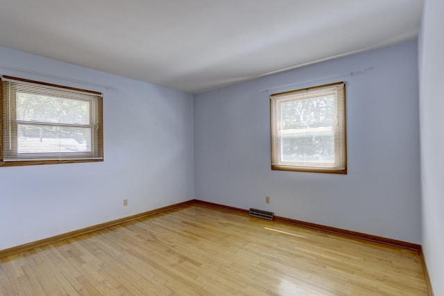 4705 Agate Ln, Madison, WI 53714 - unfurnished room featuring light wood finished floors and baseboards