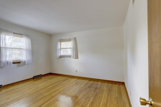 4705 Agate Ln, Madison, WI 53714 - unfurnished room featuring light wood finished floors and baseboards