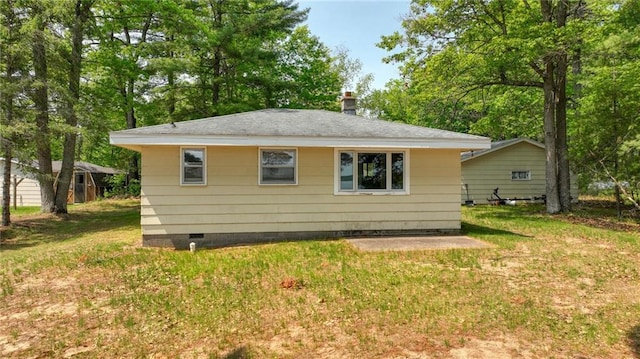 5922 W Shore Ln, Stone Lake, WI 54876 - view of home's exterior with crawl space and a lawn