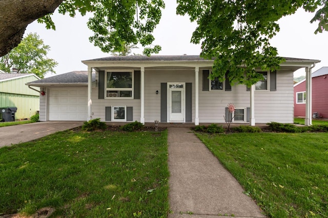 2921 Glendale Ave, La Crosse, WI 54601 - bi-level home with concrete driveway, a front lawn, a garage, and a porch