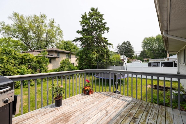 2921 Glendale Ave, La Crosse, WI 54601 - wooden deck with a trampoline