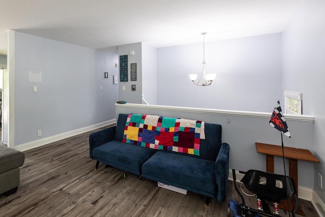 2921 Glendale Ave, La Crosse, WI 54601 - living room featuring a chandelier, wood finished floors, and baseboards