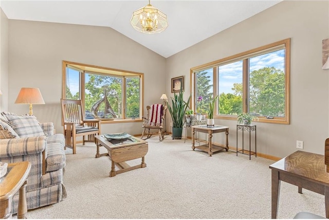 1115 S Trappers Xing, Hugo, MN 55038 - carpeted living area with a chandelier, healthy amount of natural light, vaulted ceiling, and baseboards