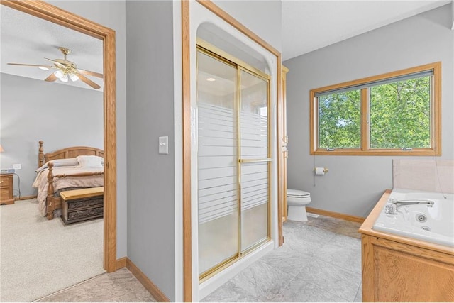 1115 S Trappers Xing, Hugo, MN 55038 - full bathroom featuring ensuite bathroom, a stall shower, toilet, a tub with jets, and baseboards