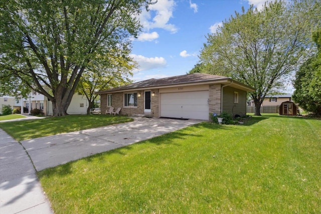 551 N Crosby Ave, Janesville, WI 53548 - single story home featuring a garage, a front lawn, concrete driveway, and brick siding
