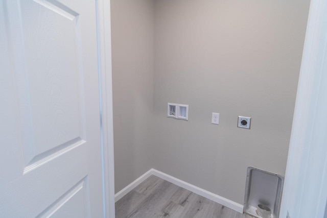 6308 Perch Dr, Weston, WI 54476 - laundry area featuring hookup for an electric dryer, hookup for a washing machine, and light wood-style floors
