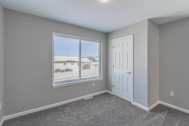 6308 Perch Dr, Weston, WI 54476 - unfurnished bedroom featuring dark colored carpet