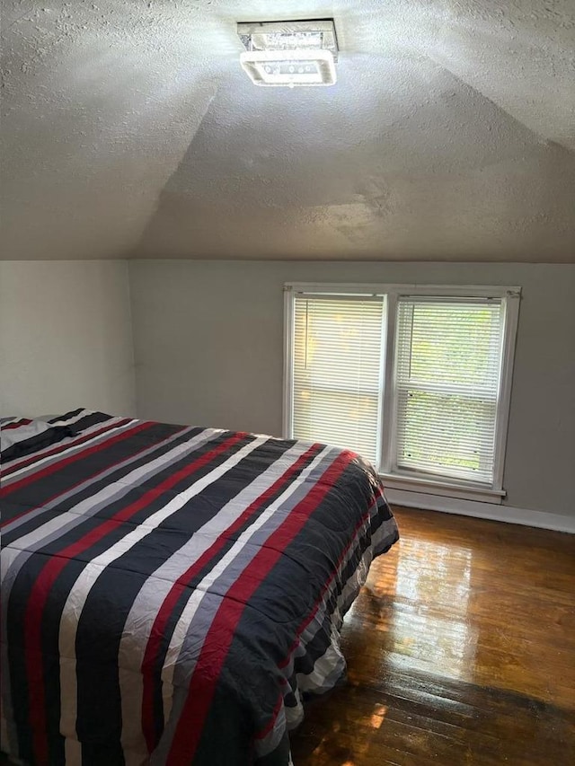 2825 N 62nd St, Milwaukee, WI 53210 - bedroom featuring hardwood / wood-style floors and a textured ceiling