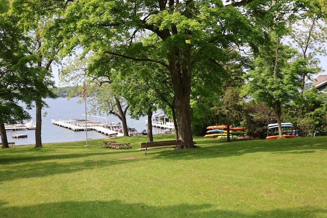 N2335 Main Rd, Lake Geneva, WI 53147 - view of green lawn featuring a water view and a boat dock