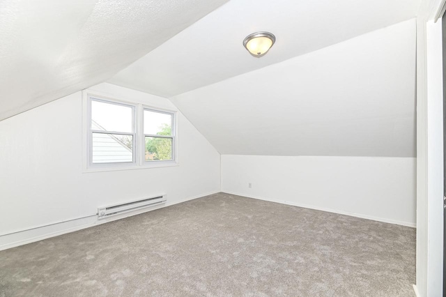 4155 N 67th St, Milwaukee, WI 53216 - additional living space featuring baseboard heating, carpet flooring, lofted ceiling, and baseboards