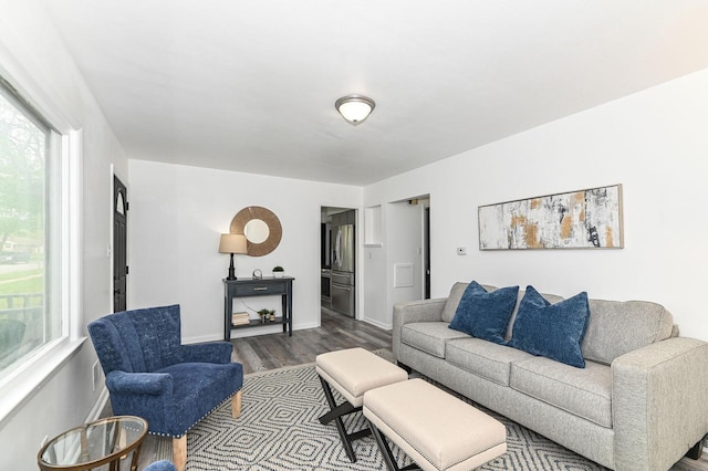 4155 N 67th St, Milwaukee, WI 53216 - living room with dark wood finished floors and baseboards