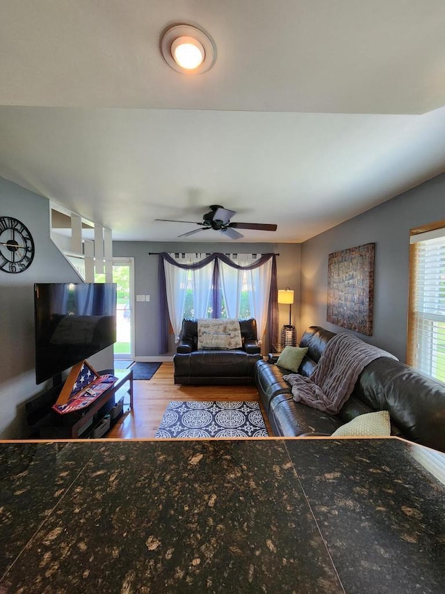 3617 S 80th St, Milwaukee, WI 53220 - living room featuring a ceiling fan and wood finished floors