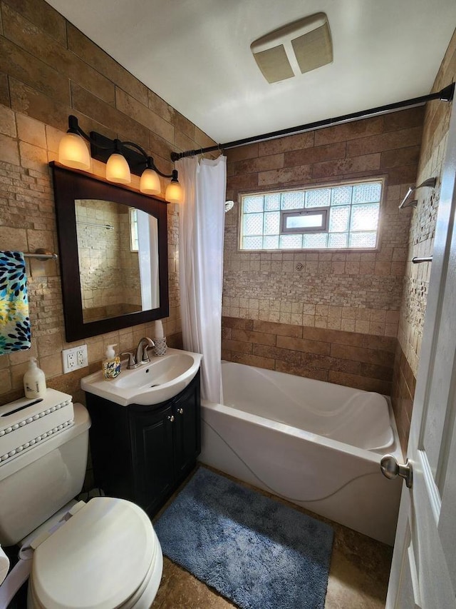 3617 S 80th St, Milwaukee, WI 53220 - full bathroom with tile walls, shower / tub combo, toilet, and vanity