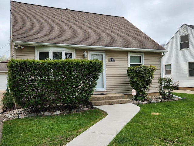 3617 S 80th St, Milwaukee, WI 53220 - view of front facade featuring a shingled roof and a front yard