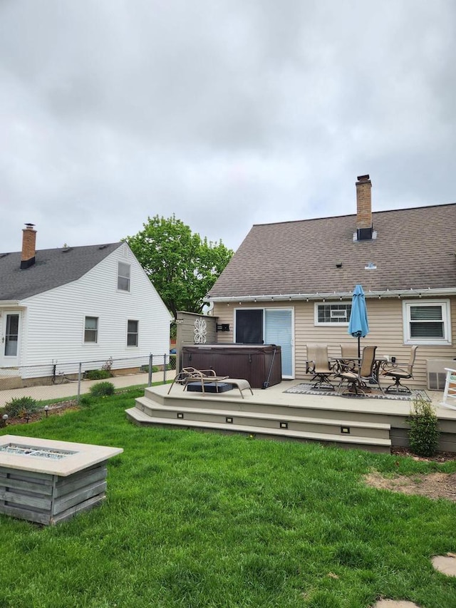 3617 S 80th St, Milwaukee, WI 53220 - view of green lawn with a hot tub, a deck, and outdoor dining area