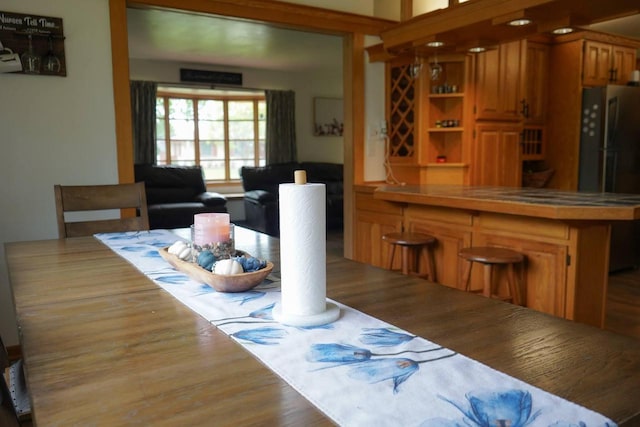 3867 S Massachusetts Ave, Milwaukee, WI 53220 - dining room featuring a dry bar and wood finished floors
