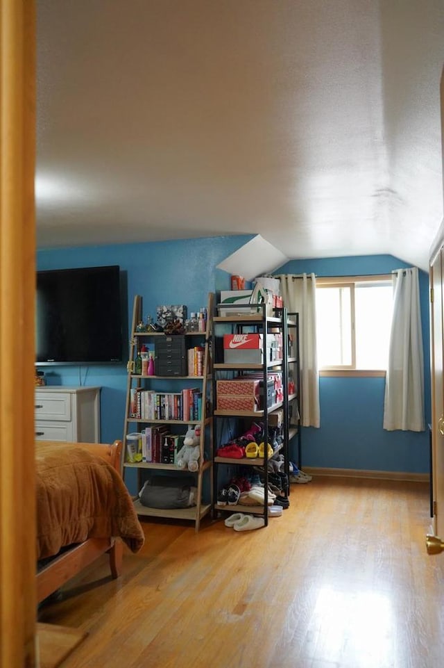3867 S Massachusetts Ave, Milwaukee, WI 53220 - bedroom featuring lofted ceiling, wood finished floors, and baseboards