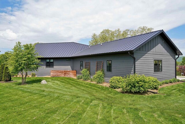E12785 Wynding Way, Merrimac, WI 53561 - back of property with a yard, metal roof, and a standing seam roof