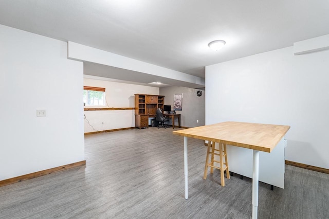 1405 Ellen Ct, Merrill, WI 54452 - dining space featuring baseboards, wood finished floors, and an office area