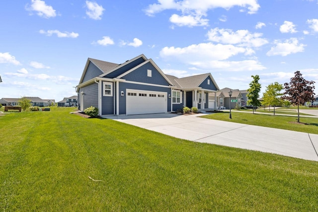 35209 Winnebago Ct, Summit, WI 53066 - view of front of house with a garage, concrete driveway, and a front yard