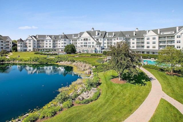 101 Osthoff Ave Unit 302A-B, Elkhart Lake, WI 53020 - view of property's community featuring a water view and a yard