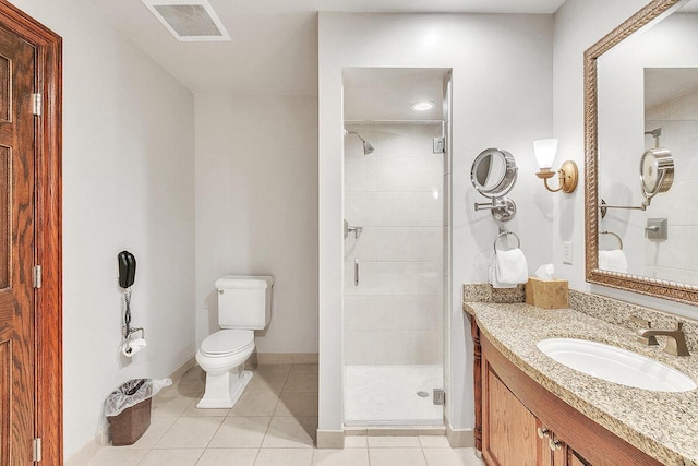 101 Osthoff Ave Unit 302A-B, Elkhart Lake, WI 53020 - bathroom featuring toilet, a stall shower, vanity, tile patterned flooring, and baseboards